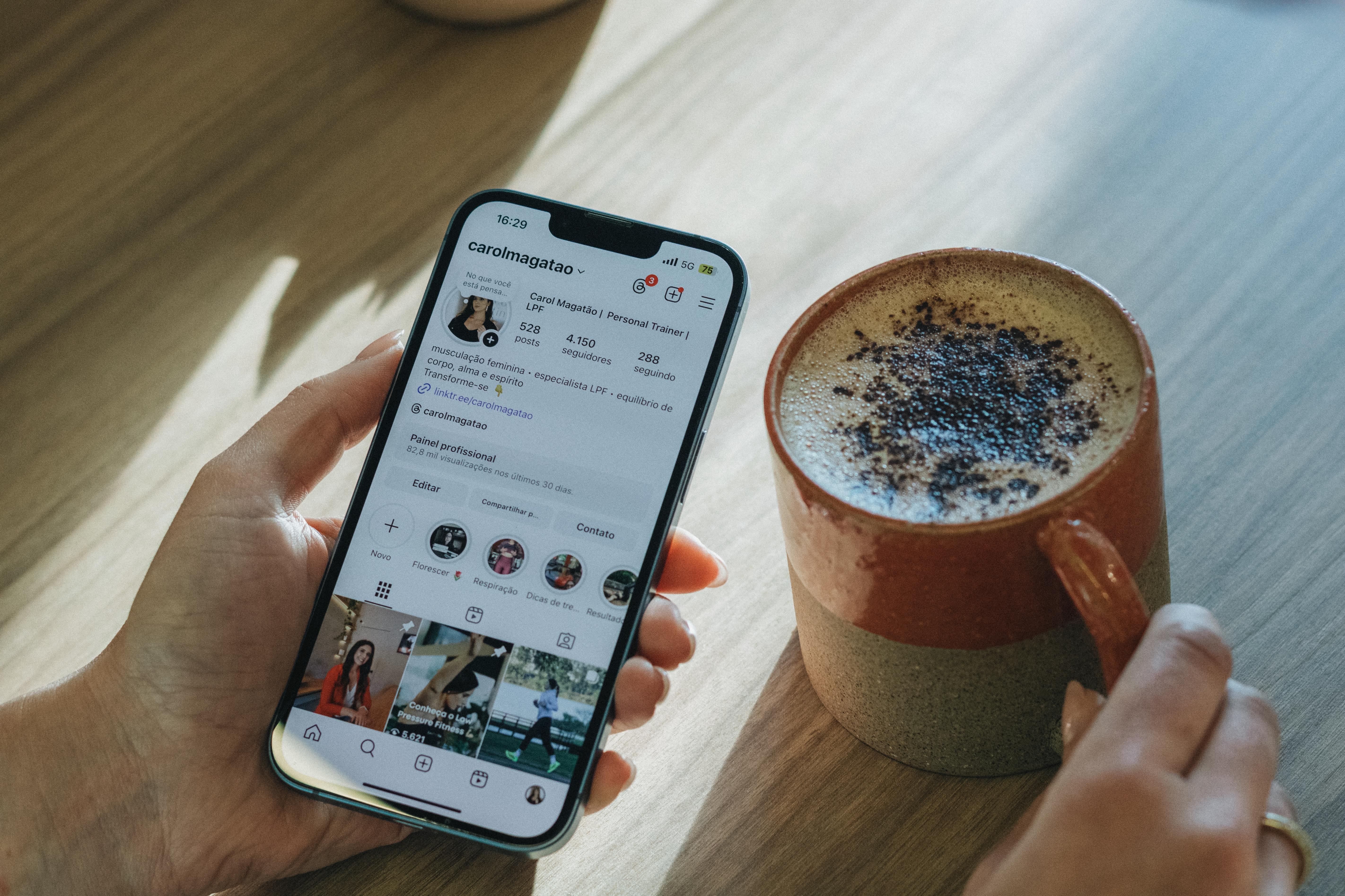 Aesthetic flatlay coffee and smartphone on table