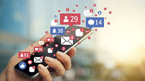 Smartphone screen with many notifications on desk